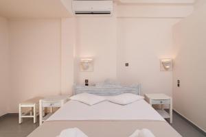 Letto o letti in una camera di Amaryllis Hotel