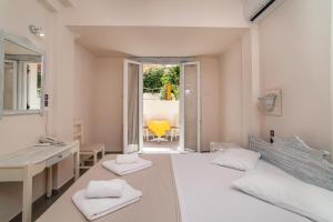 Letto o letti in una camera di Amaryllis Hotel