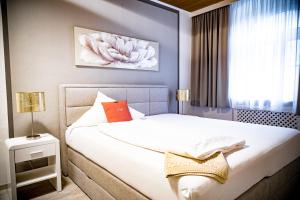 Postel nebo postele na pokoji v ubytování Hotel Der Seehof