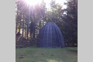 A garden outside Chalet Maso Fradea Family Resort