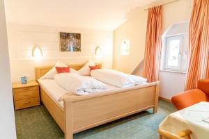 Postel nebo postele na pokoji v ubytování Hotel Der Seehof