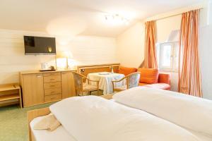 Postel nebo postele na pokoji v ubytování Hotel Der Seehof