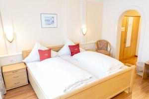 Postel nebo postele na pokoji v ubytování Hotel Der Seehof