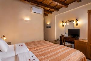 Postel nebo postele na pokoji v ubytování Palazzino Di Corina