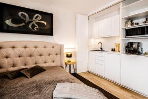 Kuchyňa alebo kuchynka v ubytovaní Apartament SEASIDE parking w cenie