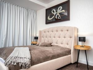 Posteľ alebo postele v izbe v ubytovaní Apartament SEASIDE parking w cenie