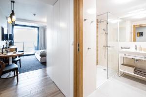 Posteľ alebo postele v izbe v ubytovaní Apartament SEASIDE parking w cenie