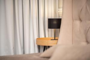 Televízia a/alebo spoločenská miestnosť v ubytovaní Apartament SEASIDE parking w cenie