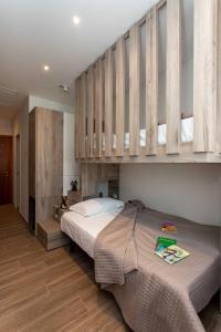 Postel nebo postele na pokoji v ubytování Hotel Rosa + 37 fotografií