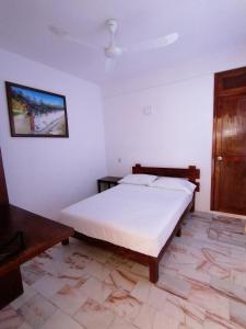 Postel nebo postele na pokoji v ubytování Don Luis Hostal - Sucursal Hidalgo - Tecolutla + 24 fotografií