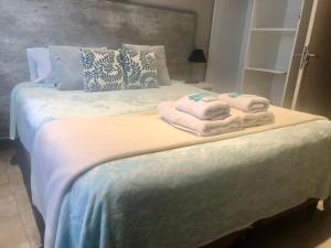Katil atau katil-katil dalam bilik di Hotel Berlin Pinamar