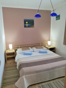 Posteľ alebo postele v izbe v ubytovaní House Marica