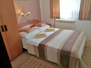 Posteľ alebo postele v izbe v ubytovaní House Marica