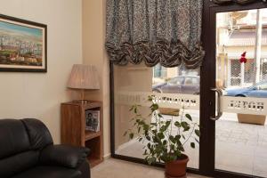 A bed or beds in a room at Hotel Motto
