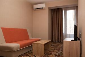 A television and/or entertainment centre at Hotel Motto