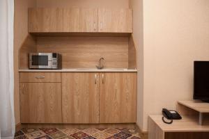 A television and/or entertainment centre at Hotel Motto