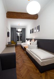 Voodi või voodid majutusasutuse Le Baldinger Boutique Hotel toas