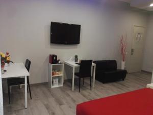 TV a/nebo společenská místnost v ubytování B&B da Lillo
