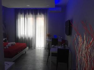 Postel nebo postele na pokoji v ubytování B&B da Lillo