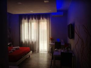 Postel nebo postele na pokoji v ubytování B&B da Lillo
