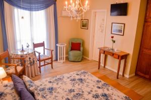 TV a/nebo společenská místnost v ubytování Hotel Pousada da Neve