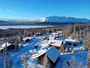 an aerial view of a resort in the snow at Ottsjö Bear Lodge in Ottsjö