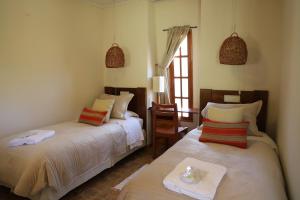 Llit o llits en una habitació de Terrace Lodge