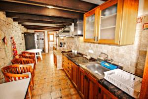 A kitchen or kitchenette at El Portet - beachfront holiday home with private pool in Moraira
