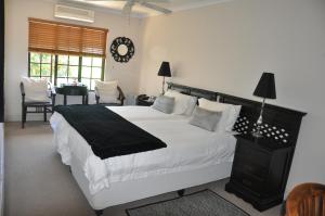 Un ou plusieurs lits dans un hébergement de l'établissement 268 On Ridge Guesthouse
