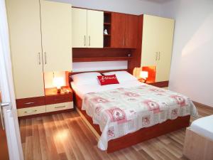 Voodi või voodid majutusasutuse Apartman Marija toas