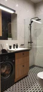 Kúpeľňa v ubytovaní Apartament 56