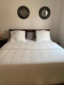 Ένα ή περισσότερα κρεβάτια σε δωμάτιο στο Villa Luxury Baguida +37 φωτογραφίες