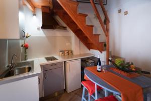 a small kitchen with a sink and a counter top at La Canela in Santa Cruz de la Palma