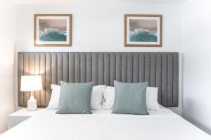 Voodi või voodid majutusasutuse Rumba Beach Resort toas
