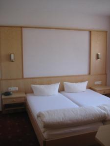 Postel nebo postele na pokoji v ubytování Apart Alcazar