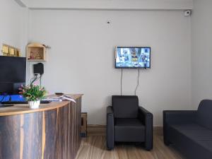 A television and/or entertainment centre at Dip Holidays
