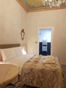 Postel nebo postele na pokoji v ubytování Il Sogno Torino Guesthouse