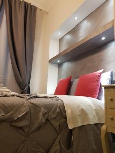 Postel nebo postele na pokoji v ubytování Il Sogno Torino Guesthouse