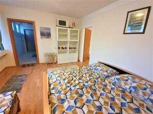 Posteľ alebo postele v izbe v ubytovaní Apartments ChezTom Nenzing