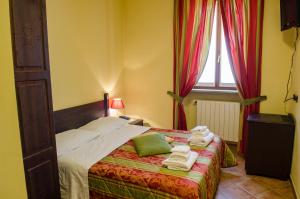 Postel nebo postele na pokoji v ubytování Hotel Oberje Dla Viere + 37 fotografií
