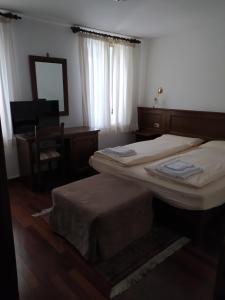 Voodi või voodid majutusasutuse Locanda Aurora B&B toas