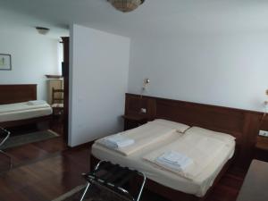 Voodi või voodid majutusasutuse Locanda Aurora B&B toas