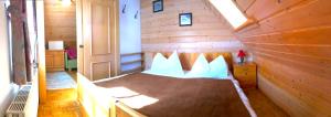 A bed or beds in a room at Appartements Futtertrögl