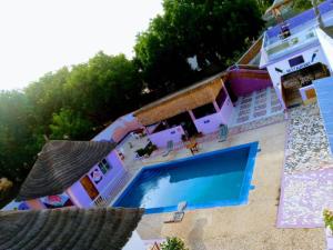 A view of the pool at Nouvelle vision des coquillages CHEZ NABOU or nearby