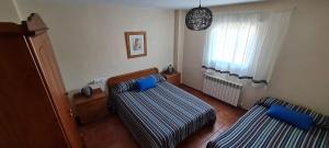 Posteľ alebo postele v izbe v ubytovaní Apartamento Rural Coll d'Ares