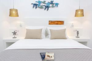 Postel nebo postele na pokoji v ubytování New - Cycladic Lifestyle Apartment Naxos Town