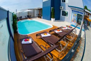 Swimmingpoolen hos eller tæt på Pousada Villarejo Armação