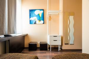 TV a/nebo společenská místnost v ubytování Apple City Hotel + 28 fotografií