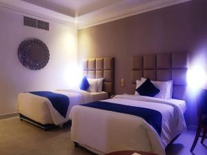 Katil atau katil-katil dalam bilik di Panorama Hotel and Spa