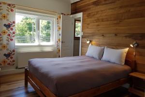 Postel nebo postele na pokoji v ubytování Hostal Compass del Sur